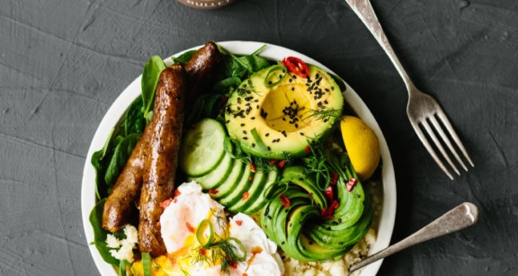 A bowl of mixed vegetables and sausage