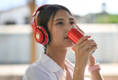 Person drinking out of a can