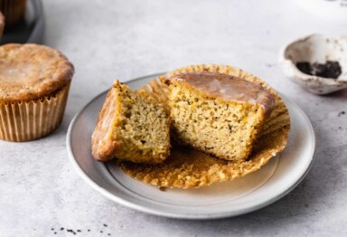 Bulletproof lemon poppy seed muffins cut in half on a plate