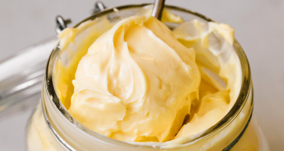 An open container of fresh butter