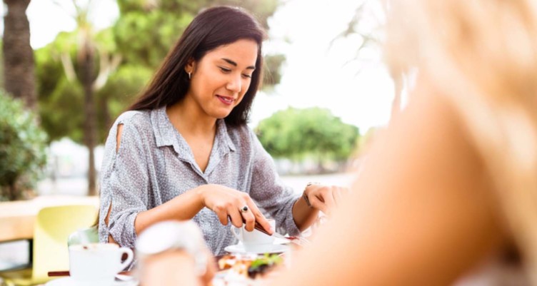 woman eating outside