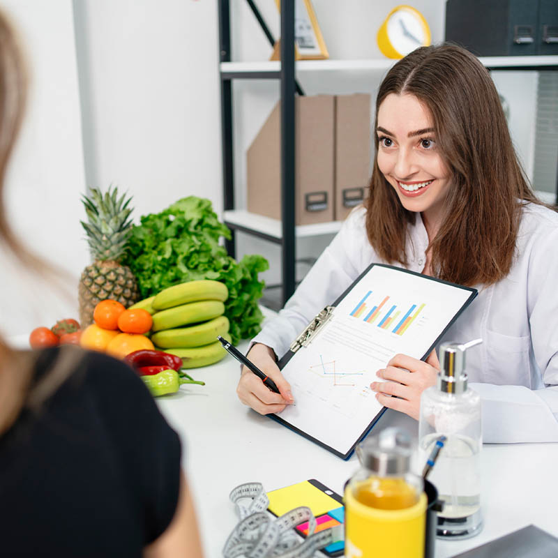 nutritionist working with a client