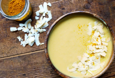 Yellow turmeric smoothie bowl