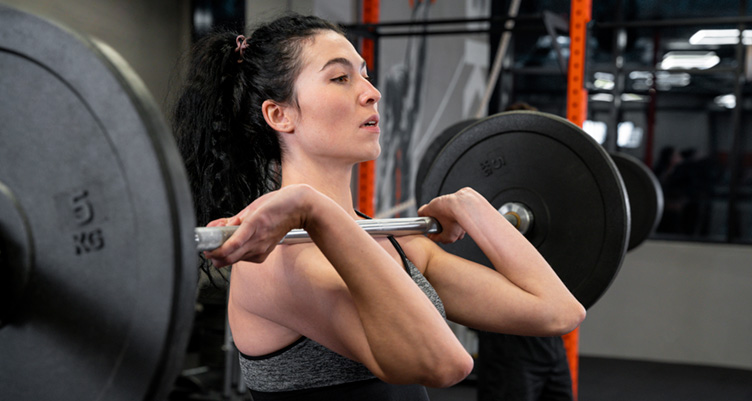 a woman lifting weights